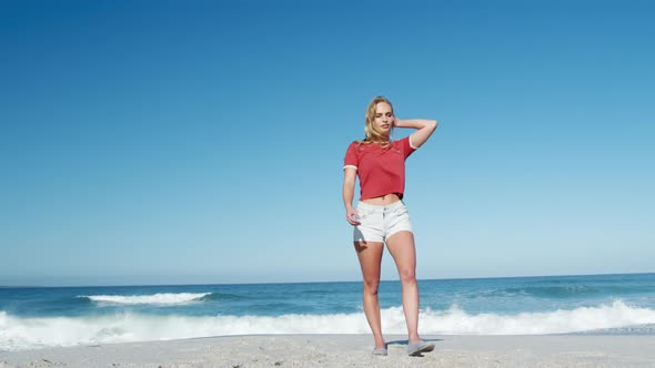 Woman standing on the beach