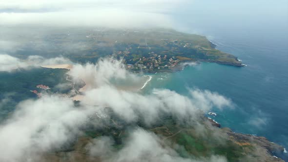 Cantabria Coastline, Scenic Ajo bay, Aerial view above clouds, Spain