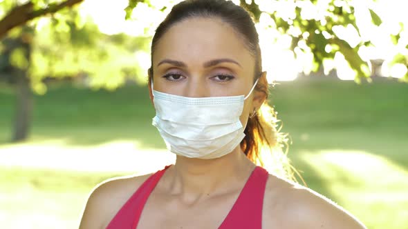 Woman in Face Mask on Nature