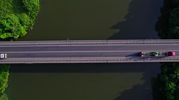 Traffic on the Bridge That Crosses the River