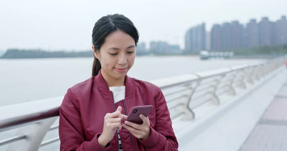 Woman use of smart phone at outdoor