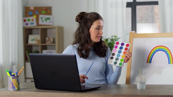 Teacher with Colors Having Online Class of Arts