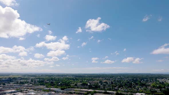 Airplane Leaving Vancouver International Airport Flying Over Richmond City In British Columbia, Cana