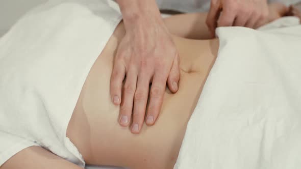 Massaging Female Abdomen