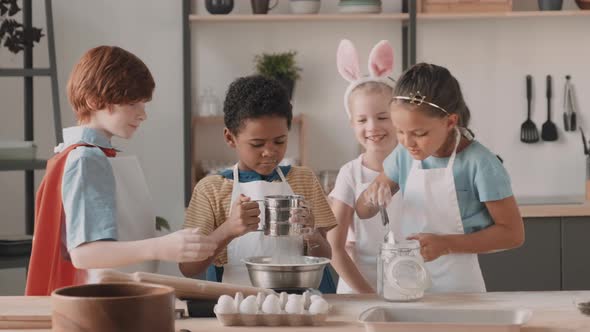 Diverse Children Playing in Kitchen