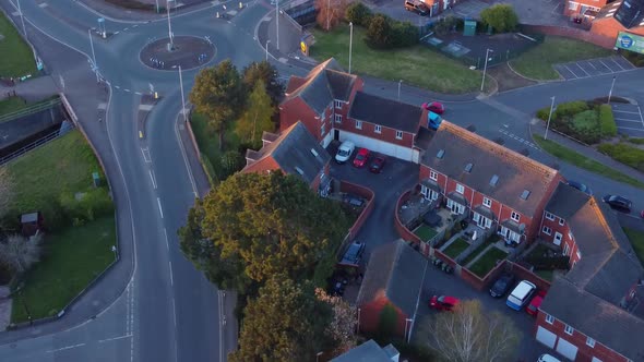 Golden hour aerial view over a roundabout in Exeter, UK.
