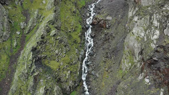 Midagrabindon Waterfalls inCaucasus Mountains