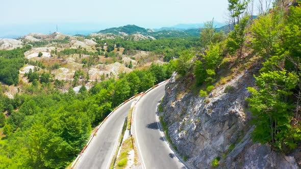 Aerial View on Serpentine Road in the Mountains Lovcen in Montenegro