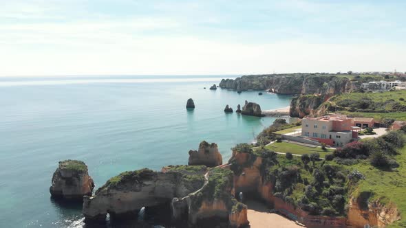 Rugged Picturesque Coastline of Lagos near Estudante Beach, Algarve, Portugal