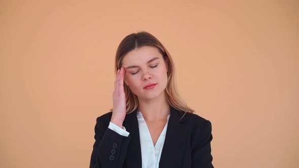 Woman with Pain in Her Temples American Woman in Black Jacket Suffering From Stress or Headache