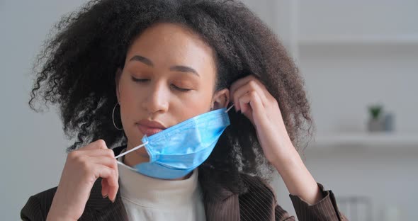 Portrait Sad Afro American Curlyhaired Business Woman Girl Student Takes Off Her Medical Face Mask