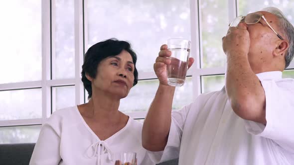 Asian elderly couple spending time together at home.