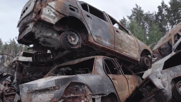 War in Ukraine a Dump of Burned Cars in Irpin Bucha District