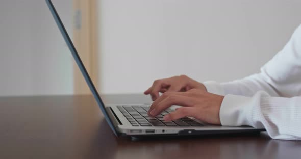 Woman work on laptop computer at home