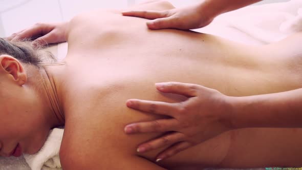 Woman Gets Back Massage Spa By Massage Therapist