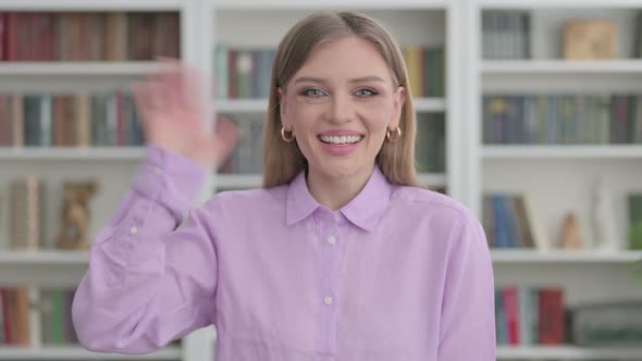 Portrait of Woman Waving Hand for Hello Welcoming