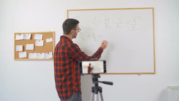Teacher Explaining Mathematics on E-learning Platform Online