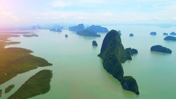 An aerial view from a drone flying over the mouth of the river at Phang Nga Bay