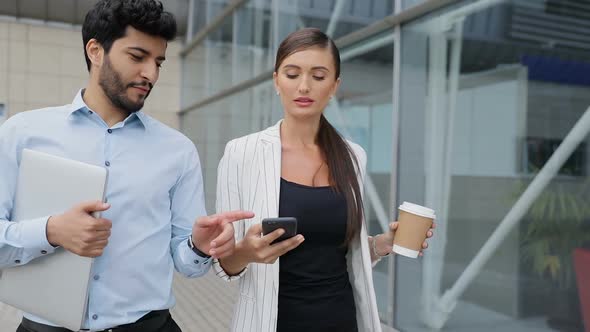 Business People Going To Work With Phone And Coffee On Street