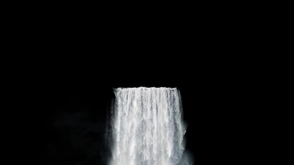 Streams Of Water Flow Down From A High Waterfall On A Black Background