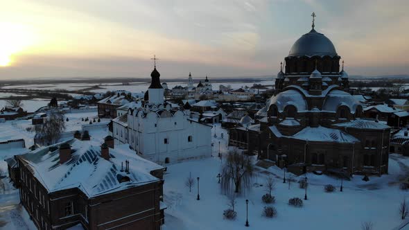 Nice Flight Between Two Different Orthodox Churches at Sunset