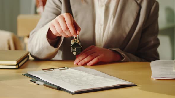 Real Estate Agent Holding Home Keys Closeup Woman Realtor