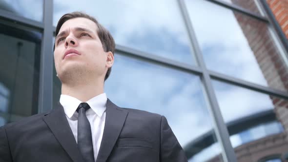 Waiting Young Businessman, Looking and Waiting for Opportunity