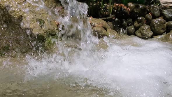 Water splashing close up in slow motion.