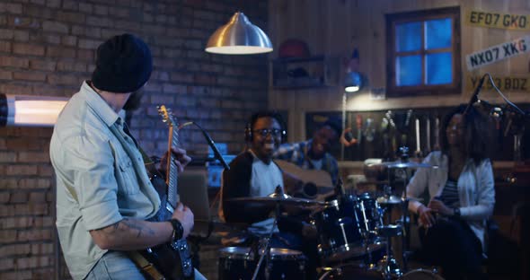 Young Musicians Rehearsing in Garage