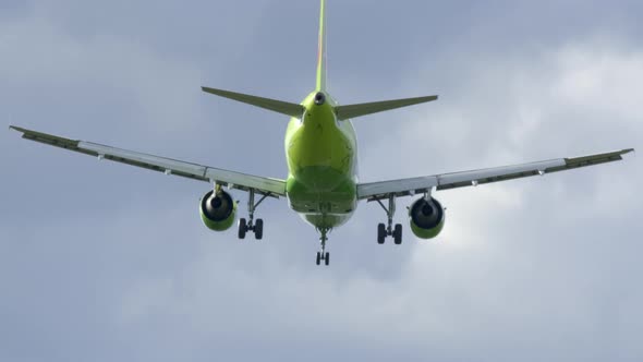 Passenger Aircraft Flying Through Sky 