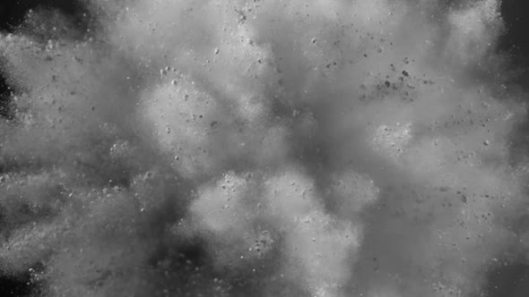 Gray particles fly after being exploded, Slow Motion