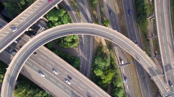 Vehicles Driving on a Mixing Interchange Bird's Eye Aerial View