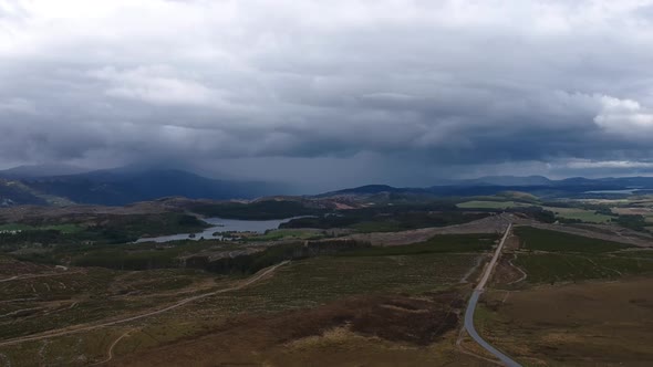 Tilt-down drone shot of scottish highlands