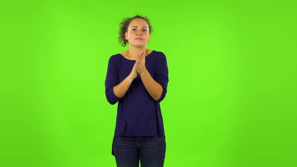 Curly Woman Froze and Trying To Keep Warm. Green Screen