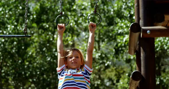 Schoolboy playing in playground