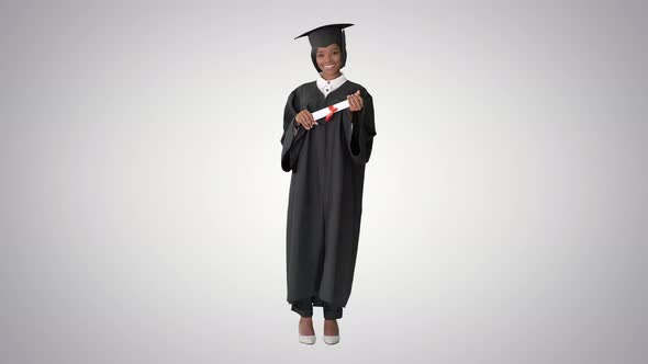 Beautiful afro american young woman graduate smiling on