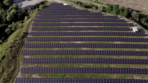 aerial view of solar power station, Aerial Top View of Solar Farm with Sunlight, Renewable Energy