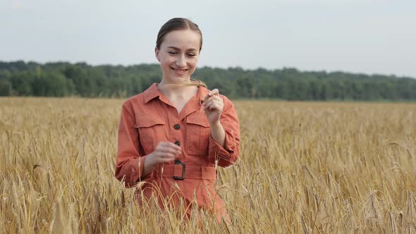 Caucasian Agronomist checking the field of cereals