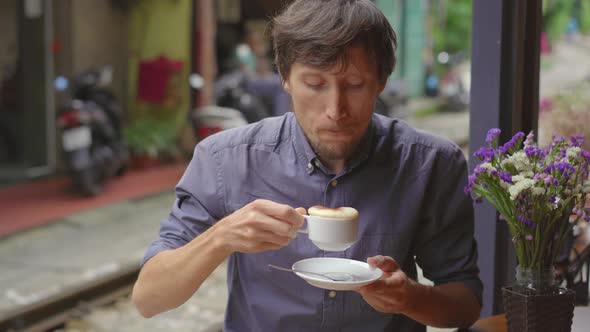 Young Man Traveler Explores Area Hanoi City Where Railway Paths Go Through Residential Area