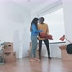 First steps of moving into new home of young multi ethnic couple - VideoHive Item for Sale