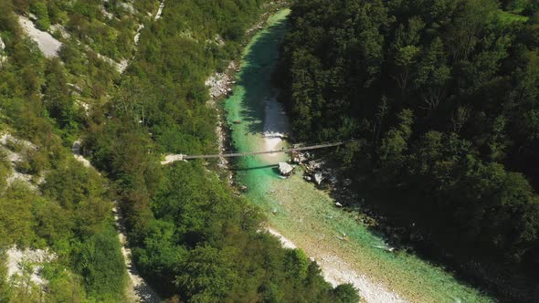 Drone Flight Over River Soca And Bridge In Forests