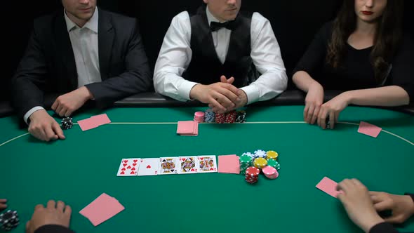 Poker Dealer Turning Up Cards, Risky Players Raising Bet, Hobby Tournament, Luck