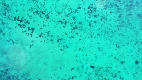 Wide angle above tourism shot of a sunshine white sandy paradise beach and blue sea background in hi