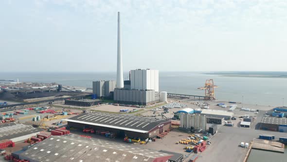 Aerial View Slow Rotation Over the City of Esbjerg with His Harbor and the Steelcon Chimney of the