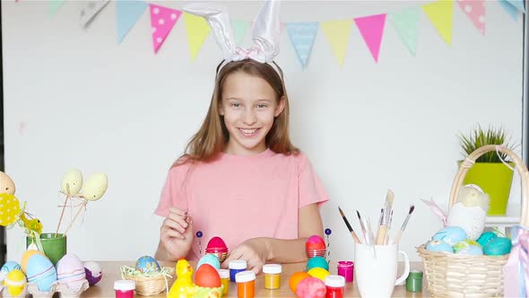 Happy Easter. Beautiful Little Kid Wearing Bunny Ears on Easter Day