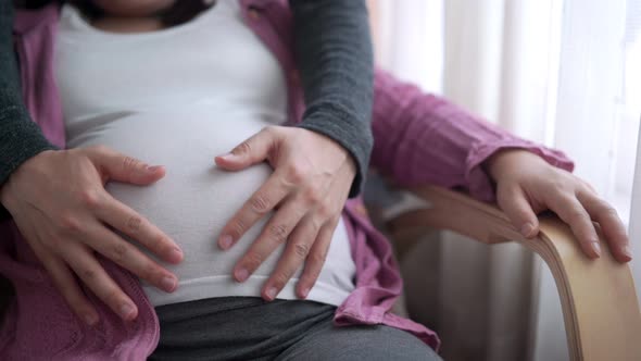 Pregnant Couple Feels Love and Relax at Home