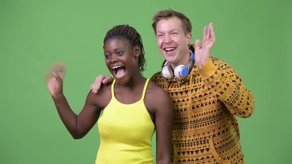 Young Multi-ethnic Couple Smiling Together