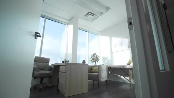 Wide shot of a chiropractor's beautiful and modern office.