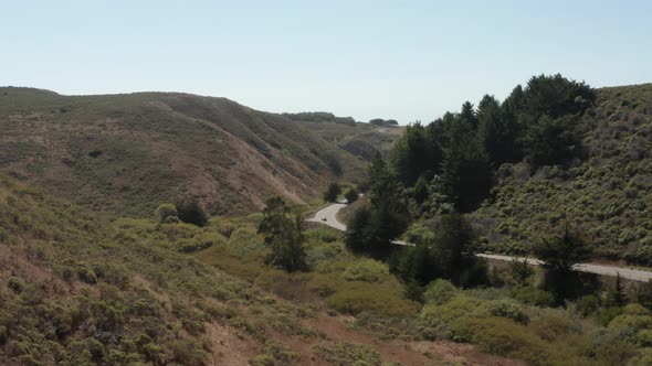 Drone shot  highway 1 going to the coast Northern California