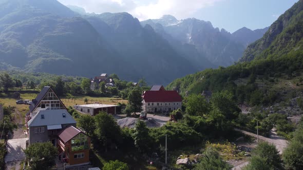 Flying Near Old Wooden Church and Trees in Thethi Valley Albania
